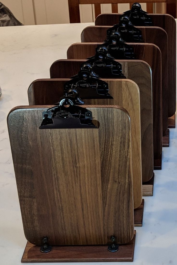 four wooden cases sitting on top of a table