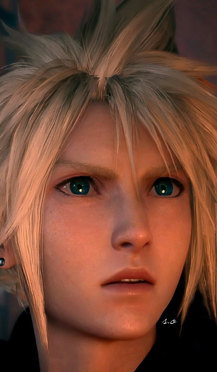 a close up of a person with blonde hair and blue eyes looking at the camera