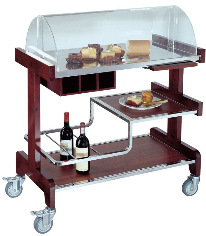 a serving cart with two bottles of wine and bread