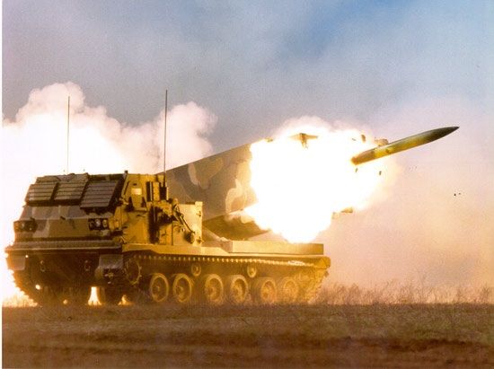 an army tank is being fired with missiles