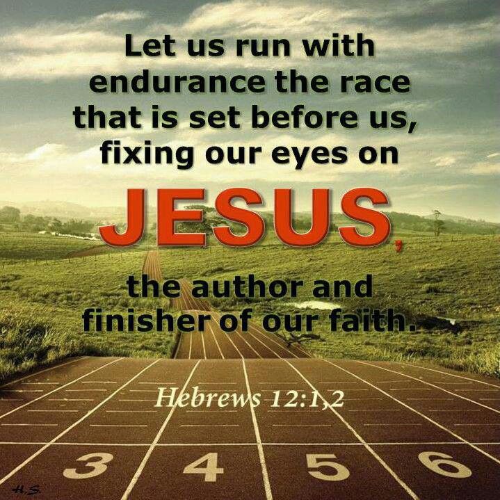 a running track with the words jesus on it and an open field in the background