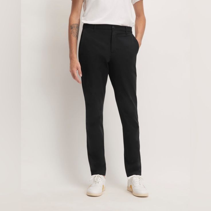 Nwt Everlane The Performance Chino | Uniform In Black. Athletic Fit. Sizes 32x32, 32x30 And 34x32 Available. Performance Chinos: Great In Theory, But Most Are Too Crinkly, Too Tech-Y, And Too Expensive. The Athletic Fit Performance Chino Has Everything We Love About Our Slim Chinosthey’re Sweat-Wicking, Quick-Drying, And Have 4-Way Stretch. The Athletic Fit Offers A Roomier Fit Through The Hip And High Style Than Our Best-Selling Slim Fit. We Recommend It For Those Who Want A Slim Fit With More Black Straight Chinos For Business Casual, Black Slim Fit Straight Leg Chinos, Tailored Black Straight Leg Chinos, Tailored Black Chinos With Welt Pockets, Business Casual Black Chinos With Welt Pockets, Black Tapered Leg Chinos For Business Casual, Black Chinos For Work With Straight Hem, Classic Black Chinos With Welt Pockets, Sleek Black Pants With Straight Hem