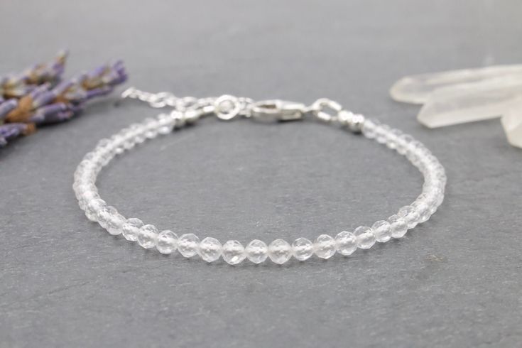 "Clear Quartz Crystal beads are strung on 49-strand wire for a simple yet sturdy piece of gemstone jewelry. This bracelet is perfect to wear alone or to add to your bracelet stack!  Clear Quartz is a perfect substitute for the birthstone of April. Gemstones ranges from 3mm to 4mm depending on supplier availability. .: G E M S T O N E :. Clear Quartz .:. The Greeks called Quartz krystallos meaning \"ice.\" Clear Quartz is said to absorb, store, release and regulate energy.  .:. D E T A I L S .:. Adjustable Gemstone Beads Bracelet For Wedding, Clear Quartz Bracelet, Adjustable Silver Bracelet, Bracelet Stacking, Birthstone Bracelets, Quartz Bracelet, Clear Quartz Crystal, Faceted Gemstones, Bracelet Stack