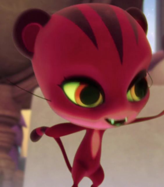 an animated red cat with big eyes and green eyes standing in front of a building