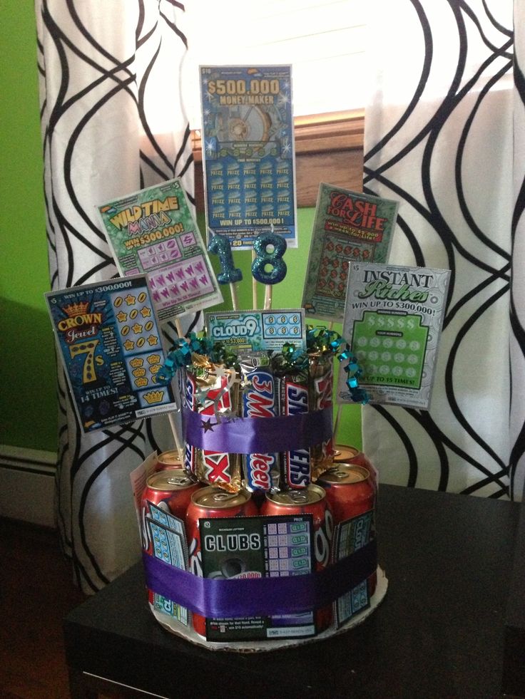 a birthday cake made to look like it is stacked on top of each other with soda cans