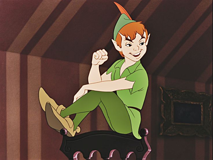 a cartoon character sitting on top of a bed