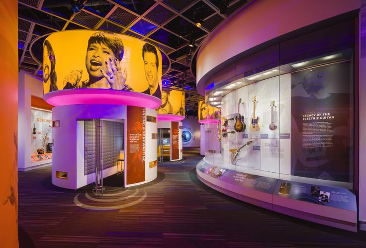 the museum displays many different types of musical instruments and music memorabilia, including an image of elvis presley