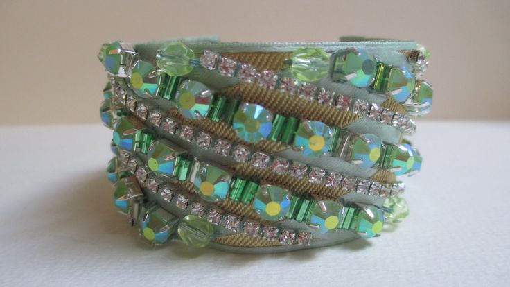 Cuff Bracelet Pale Green Rhinestone Chain Hand Beaded Satin by audreymivey on Etsy Bohemian Rhinestone Bracelets For Party, Green Rhinestone Bracelets For Wedding, Green Embellished Jewelry For Gifts, Harlequin Pattern, Vintage Jewelry Crafts, Rhinestone Chain, Absolutely Fabulous, Green Satin, Pale Green