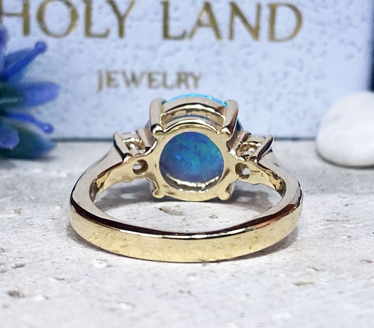 Don't miss this opportunity to own this beautiful gemstone ring crafted in 14k gold filled => Gemstone Type - Opal, Clear Quartz => Gemstone Cut - Cabochon, Faceted => Gemstone Size - 10 mm, 3 mm => Total Number of Gemstones - 3 => Metal Type - 14k Gold Filled (Tarnish Resistant And Nickel Free) - also available in 925 sterling silver * Please contact me for pricing on a sizes larger than 11 * ~ Feel free to ask me about custom made designs. ❏ Replacements and custom orders : ✪ 92 Gold Opal Ring With Round Stone, Yellow Gold Jewelry With Round Accent Stones, Yellow Gold Crystal Ring With Accent Stones, Yellow Gold Crystal Ring With Round Cut Accent Stones, Gold Opal Jewelry With Prong Setting, Fine Jewelry Opal Ring With Accent Stones For Anniversary, Gold Opal Ring With Center Stone, Yellow Gold Jewelry With Accent Stones In Round Band, Yellow Gold Opal Ring With Round Gemstone