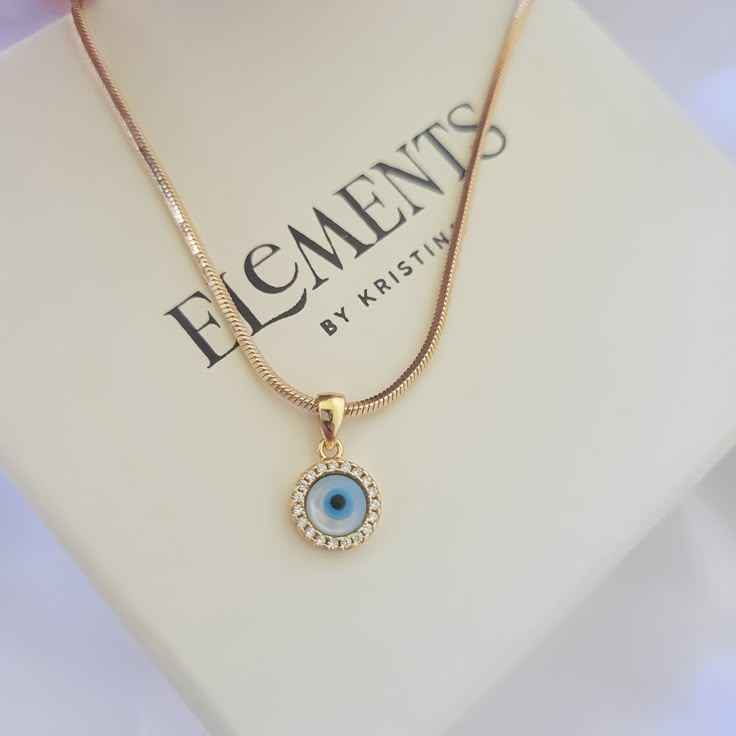 Evil eye necklace. Wear it on it's own or layer it. Pendant details: * Finish: non tarnish 18K gold filled * Measurements: 0.6'H 0.3'W Chain: non tarnish gold filled Comes in our gift ready packaging: soft velvet pouch for safe jewelry storing and branded box Evil Eye Gold Chain, Evil Eye Chains, Evil Eye Gold Pendant, Aesthetic Pendant Necklace, Chain Pendant Designs Gold, Evil Eye Chain Necklace, Chain Locket, Locket Design, Evil Eye Necklace Gold