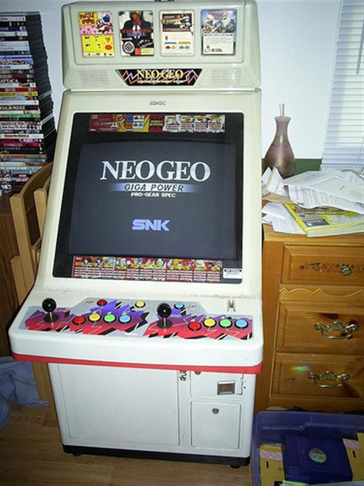 an old style video game sitting on top of a dresser