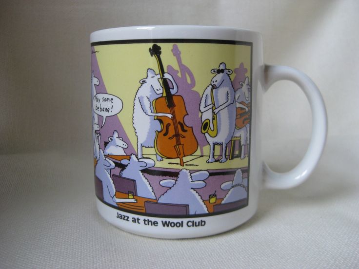 a coffee mug with an image of two bears playing the violin and another bear singing