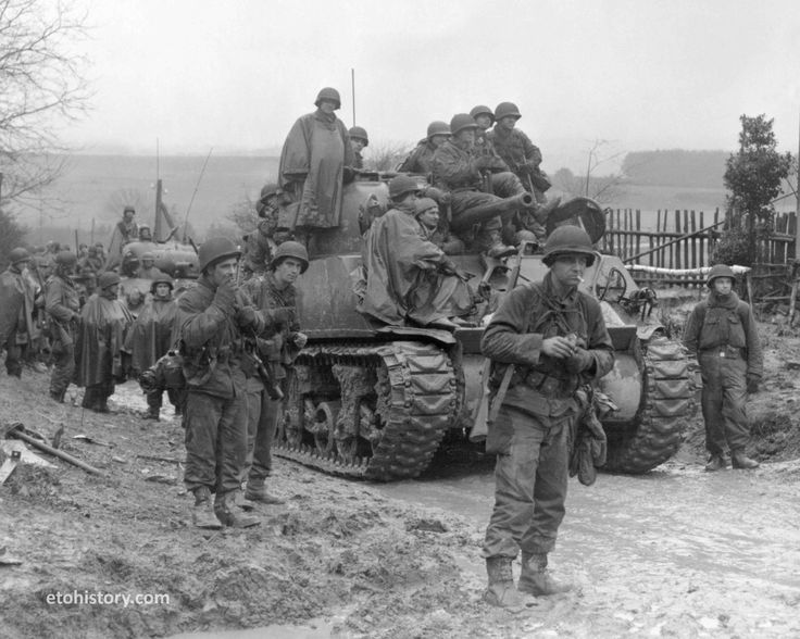 8 March 1945: After a break, 2nd Infantry Division troops load up on tanks from the 741st Tank battalion and prepare to move on to Harscheid, Germany. M4 Sherman Tank, 2nd Infantry Division, Panzer Ii, M4 Sherman, American Tank, Panzer Iv, Sherman Tank, Wwii Photos, Tank Destroyer