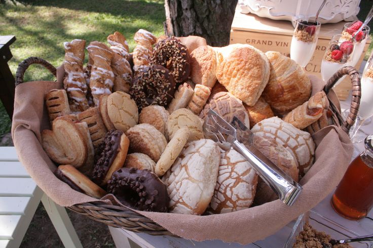 a basket filled with lots of different types of cookies