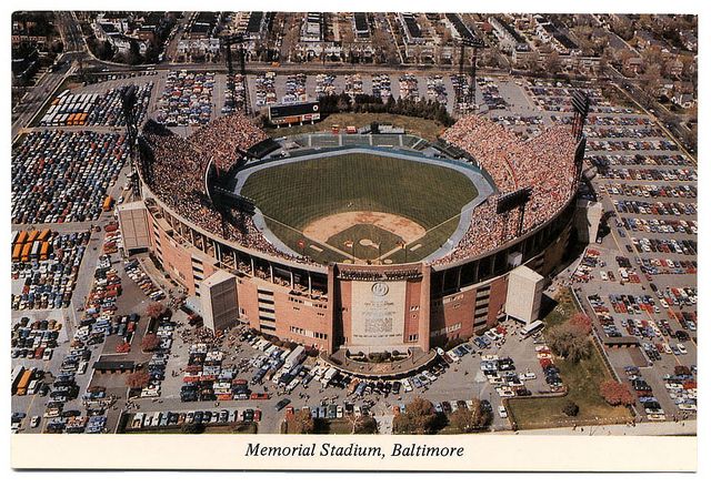 an aerial view of a baseball stadium and parking lot