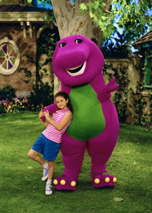 Selena Gomez as Gianna, posing with Barney, on the set of Barney and ...