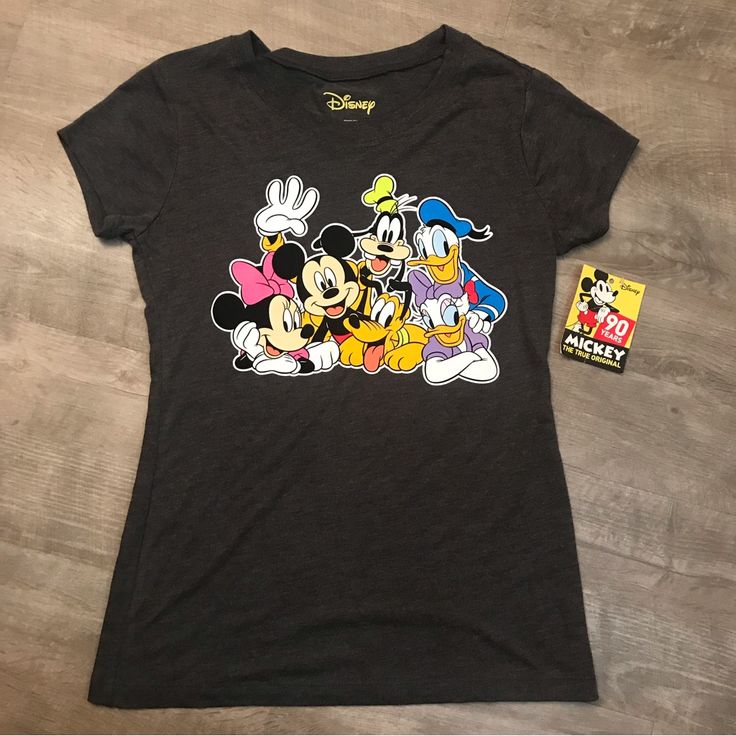 Adorable And Classic Disney Tee. Unfortunately My Little One Got Her Hands On Some Markers And Colored On The Tag! But The Shirt Is Still Fine And Brand New! Casual Multicolor T-shirt For Disney Trips, Disney Character Print Tops For Disney Trips, Disney Character Print Tops, Casual Tops For Disney Trips, Fun Mickey Mouse Tops For Disney Trips, Fun Mickey Mouse Top For Disney Trips, Fun Multicolor Fan Merchandise Tops, Fun Multicolor Fan Merchandise Top, Playful Tops With Character Print For Fan Merchandise