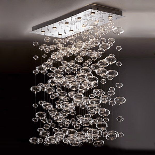 a modern chandelier hanging from the ceiling