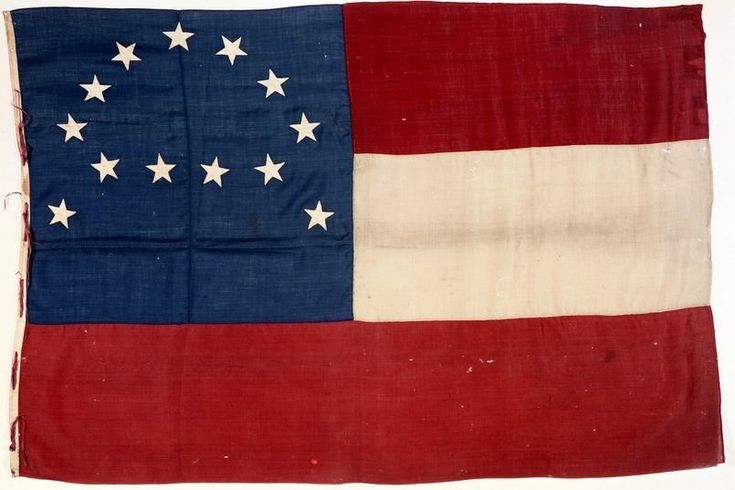 an old american flag with white stars on it