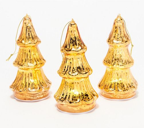 three gold christmas trees are shown on a white background