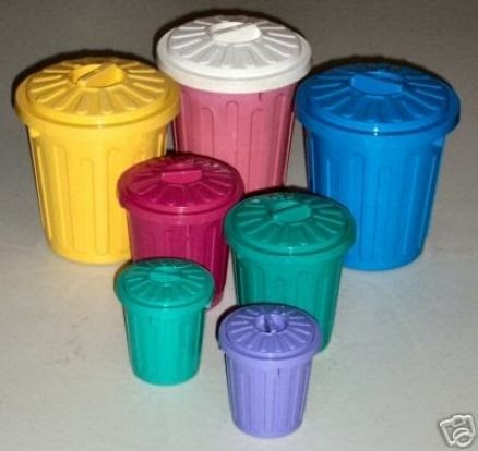 there are many different colored plastic cups on the table