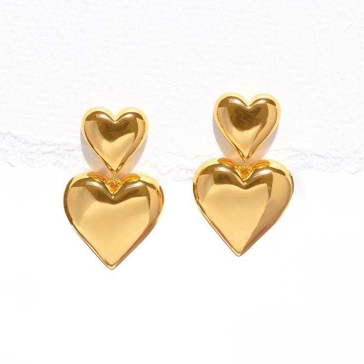 Give double the love with the Heartfelt Dangle Earrings! These bold beauties feature not one, but two hearts, adding a playful touch to your style. Whether you're off for a casual coffee date or a night out with friends, these earrings are your perfect match for a look that's as cute and fun as you are! Coffee Date, Disney Jewelry, Two Hearts, Gold Earrings Dangle, Girls Earrings, Jewelry Companies, Perfect Match, Sale Items, Gold Earrings