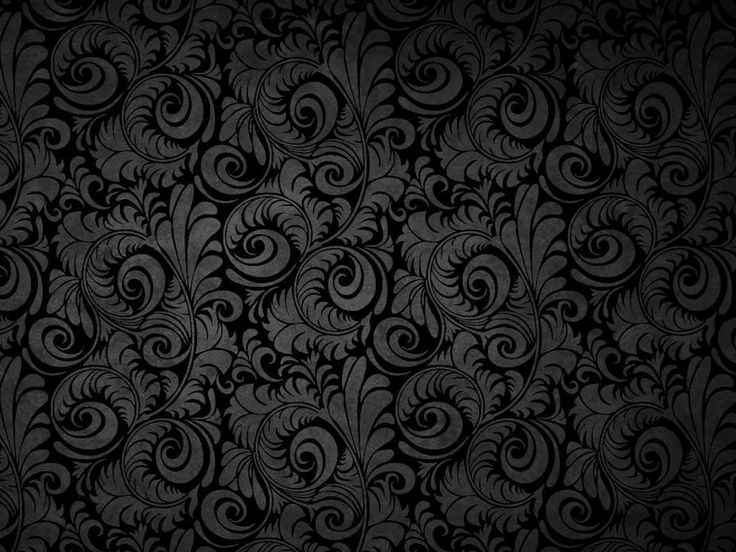 an abstract black and white wallpaper with swirly designs on the bottom half of it