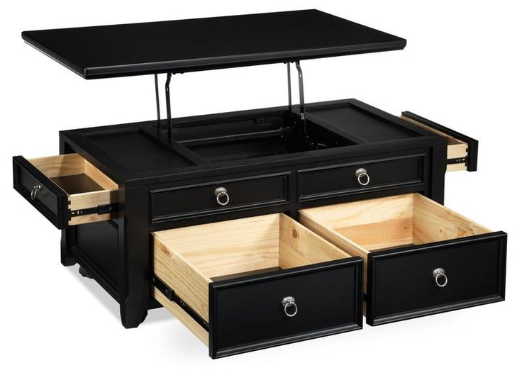 a black coffee table with drawers underneath it