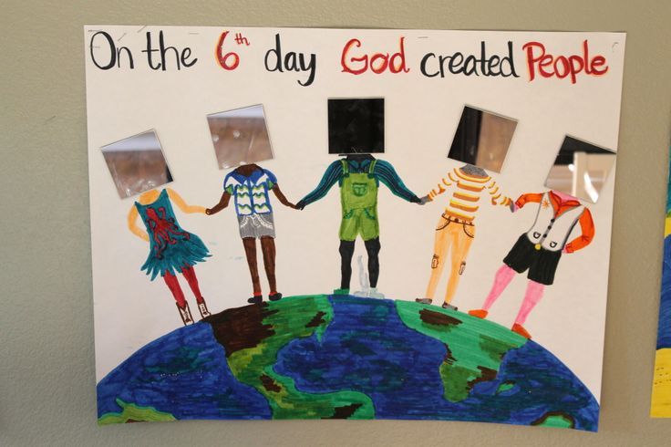 a bulletin board with people holding hands on top of the earth