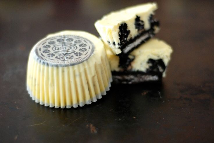 two pieces of cake sitting next to each other on a table