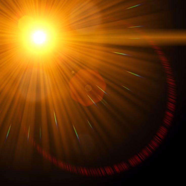 the sun is shining brightly in the dark sky with lens flares on it's side