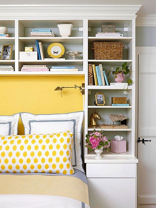 a bed room with a book shelf filled with books