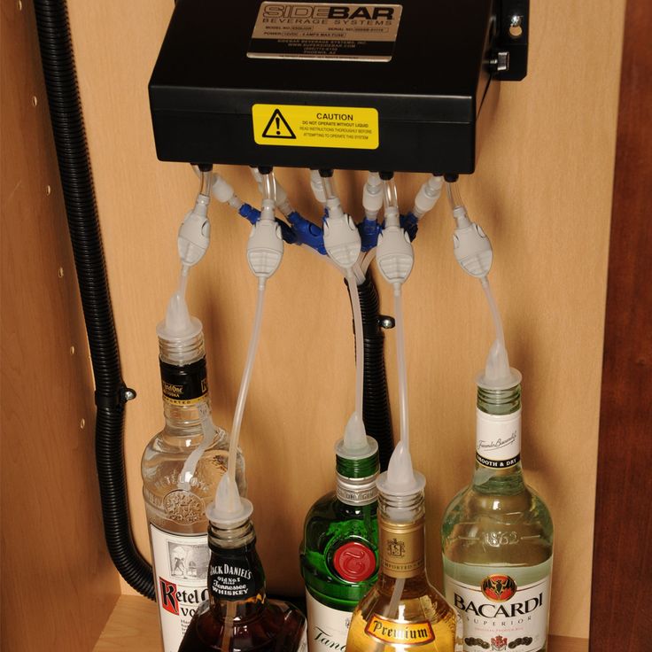 liquor bottles are connected to an electronic device