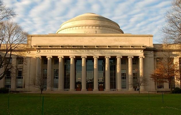 a large building with columns and a dome on top