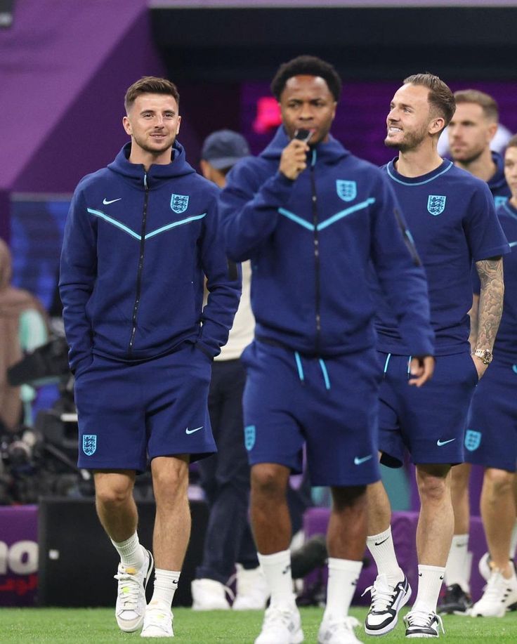 the soccer players are walking on the field during a training session in preparation for their upcoming match