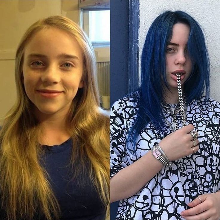 two women with blue hair are posing for the camera and one is brushing her teeth