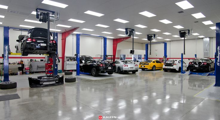 a garage filled with lots of different cars