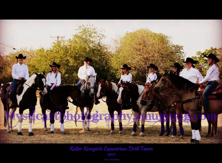 a group of men riding on the backs of horses