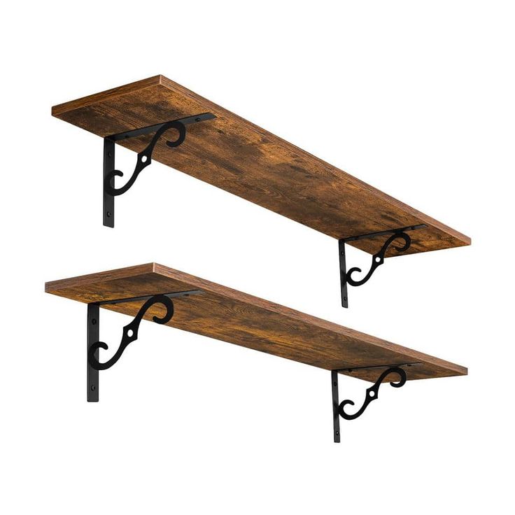 two wooden shelves with metal brackets on them