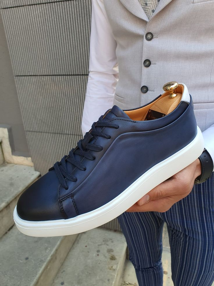 Collection: Spring – Summer 2020 Product: Lace Up Sneaker Color code: Navy Blue Shoes sole: Rubber Inner Lining: Calf Skin Lining Shoes Material: 100% Leather Available Size: 40-41-42-43-44 Package Include: Shoes Gifts: Branded Dust Bag and Box, Shoehorn, Shoeshine, Babet Socks Navy Lace-up Sneakers For Sports, Modern Blue Leather Sneakers, Navy Lace-up Sneakers With Rubber Sole, Navy Leather Lace-up Sneakers, Navy Fade-resistant Sneakers, Mens Leather Shoes, Navy Blue Shoes, Mens Designer Shoes, Bracelet Men