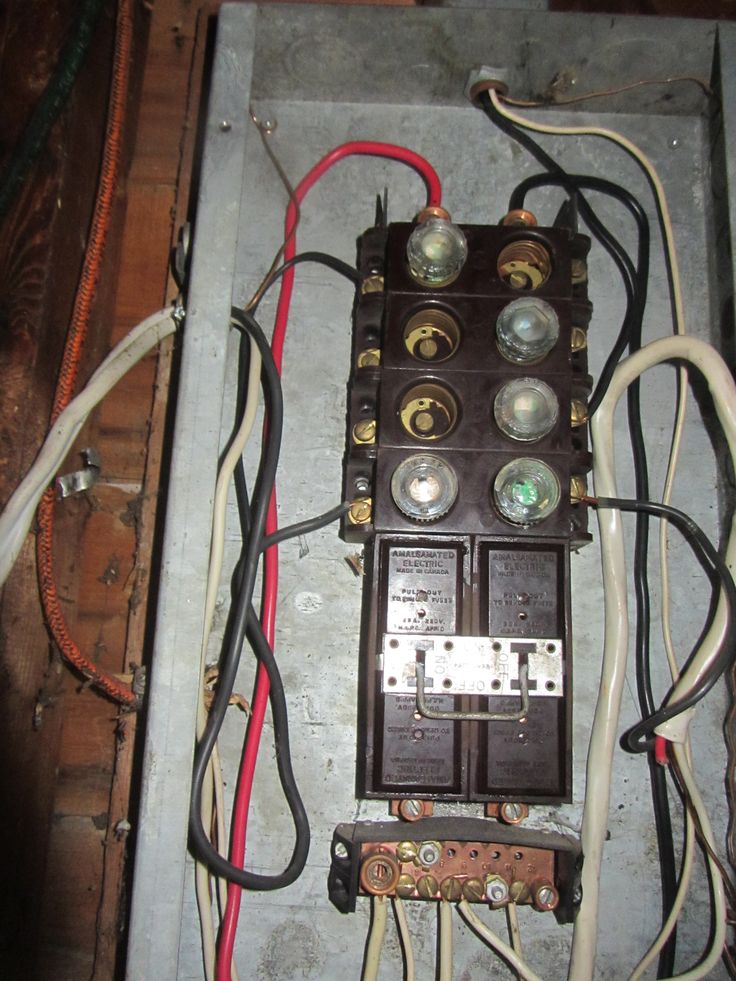 an electrical panel with multiple wires attached to it