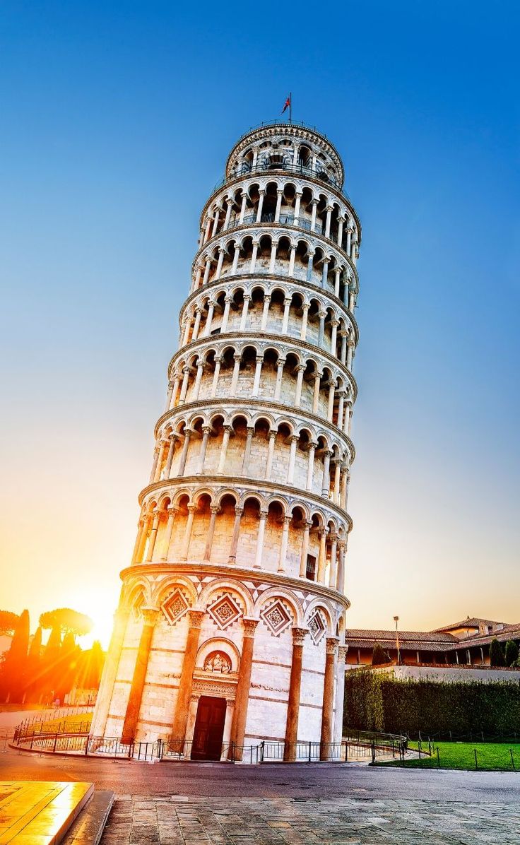 the leaning tower of pisa in italy at sunset