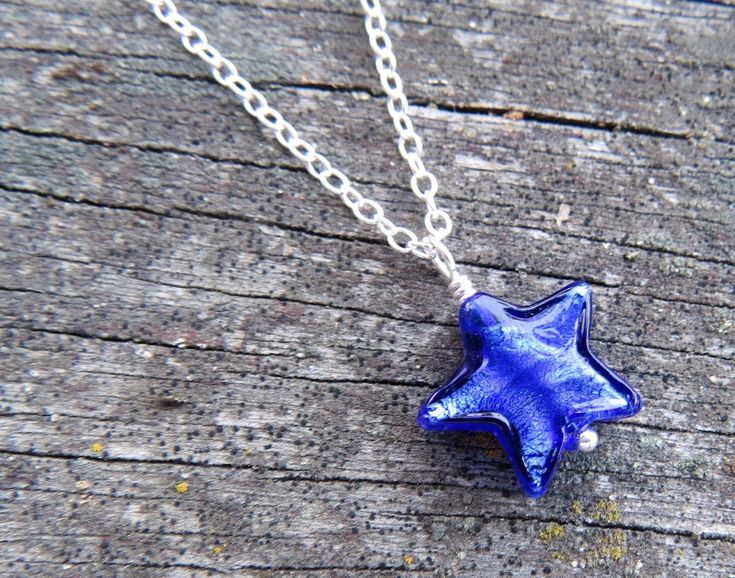 "Offered for moms who have sons or daughters in the military is our BLUE STAR MOM necklace! This was my beloved Dad's idea who retired as Command Sergeant Major from the US Army, and passed 9 months ago. I never would have known about Blue Star moms if not for him. The blue star is hand made by glass artists in Venice, Italy (Murano glass / Venetian glass), and it's small (1/2\" across). Please refer to the fourth photo to get a sense of size. Using the drop down menu, you may add an initial cha Blue Star Shaped Necklace For Gift, Blue Star-shaped Nickel-free Necklace, Blue Star Charm Necklace As Gift, Blue Star Charm Necklace As A Gift, Blue Star Charm Necklace For Gift, Blue Necklace With Star Charm As A Gift, Blue Star Charm Jewelry As Gift, Blue Star Charm Jewelry For Gift, Blue Jewelry With Star Charm For Gifts