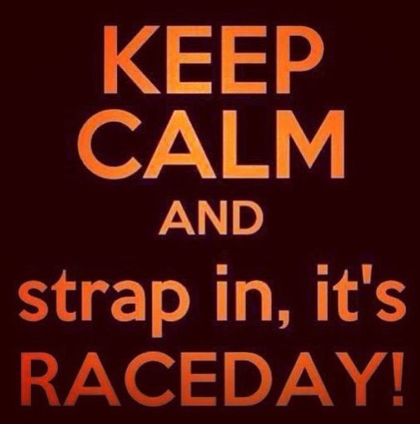 the words keep calm and strap in, it's raceday on a black background