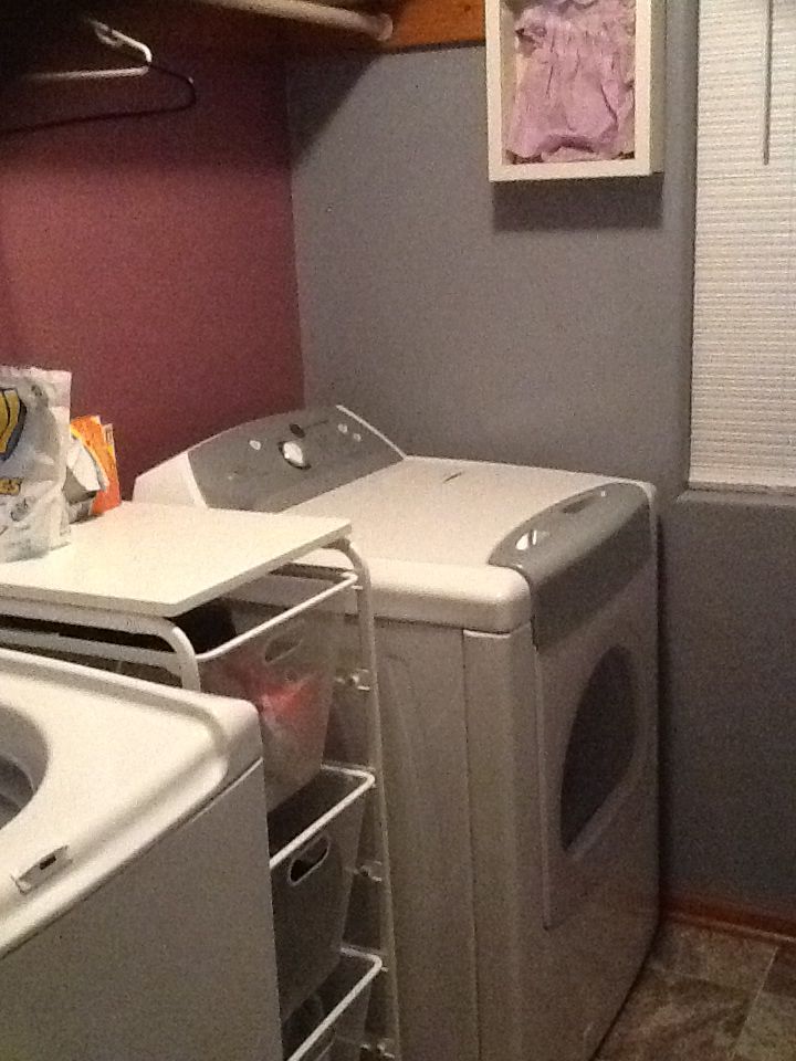 a washer and dryer in a small room