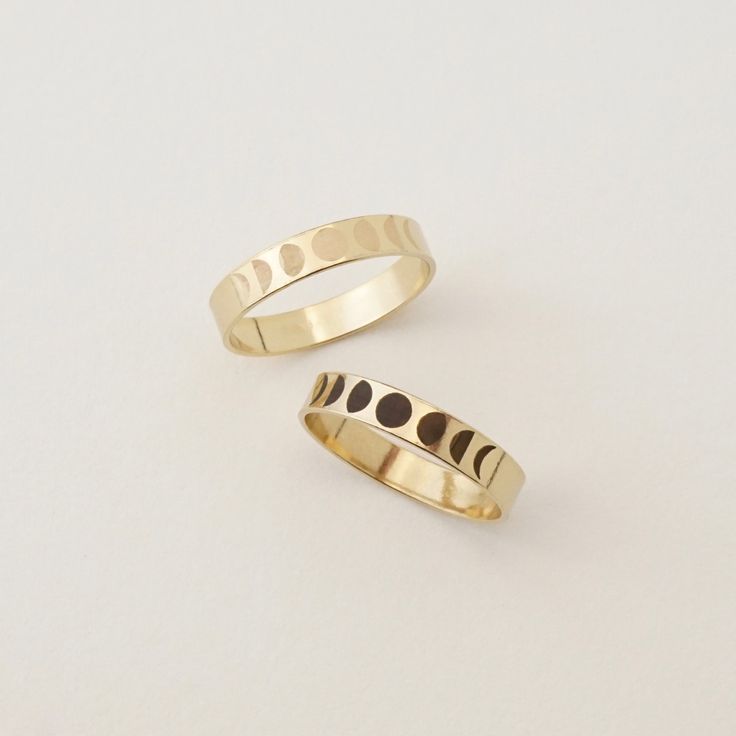 Simple and delicate, the Moon Phases Ring is beautiful and dainty on its own or stacked with another Eon or Era Ring to create your own personal stack to carry with you, at your fingers.✨ Every piece is handcrafted with love in Charleston, SC, using 90% recycled and 100% ethically sourced raw materials from the USA-- a simple way to help make our planet a better place. Includes gift-ready packaging with a recycled cotton card printed with compostable inks, recycled tissue, and a linen drawstring back printed with compostable inks! MATERIALS: * GF = 14k Gold Fill * SS = Sterling Silver DETAILS: 3.5mm Band Width AT CHECKOUT: * If you need your piece sooner than our standard production time, please select expedited shipping (and add a note with your ideal delivery date) and we will do our abs 14k Yellow Gold Moon Phase Rings, 14k Yellow Gold Rings With Moon Phase Detail, 14k Yellow Gold Rings With Moon Phase, Moon Shaped 14k Yellow Gold Rings, 14k Gold Moon Shaped Promise Ring, Crescent Moon Charm Wedding Ring, Moon Shaped Rings With Moon Charm For Anniversary, 14k Gold Moon Phase Jewelry For Anniversary, 14k Gold Moon Phase Rings As Gift