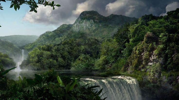 a large waterfall surrounded by lush green trees and mountains in the distance with dark clouds overhead