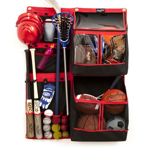 an organized sports bag is shown with various items in the compartment and on the side