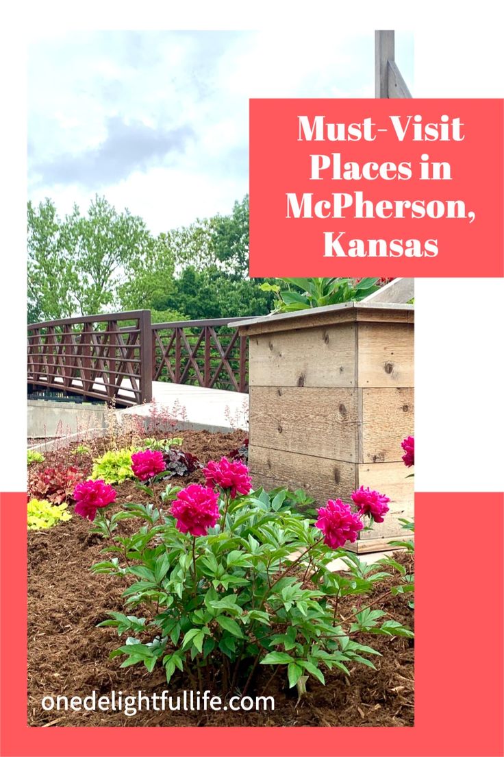 flowers in front of a wooden fence with the words must visit places in mcpherson, kansas