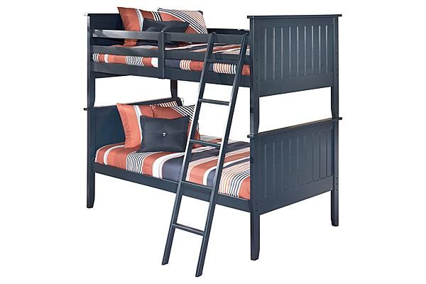 the bunk bed has two sets of pillows on top of it, and is black